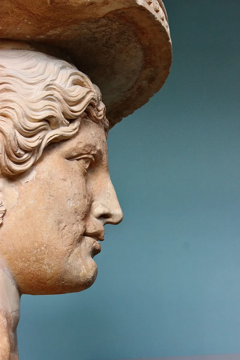 Profile of an ancient marble sculpture of a face